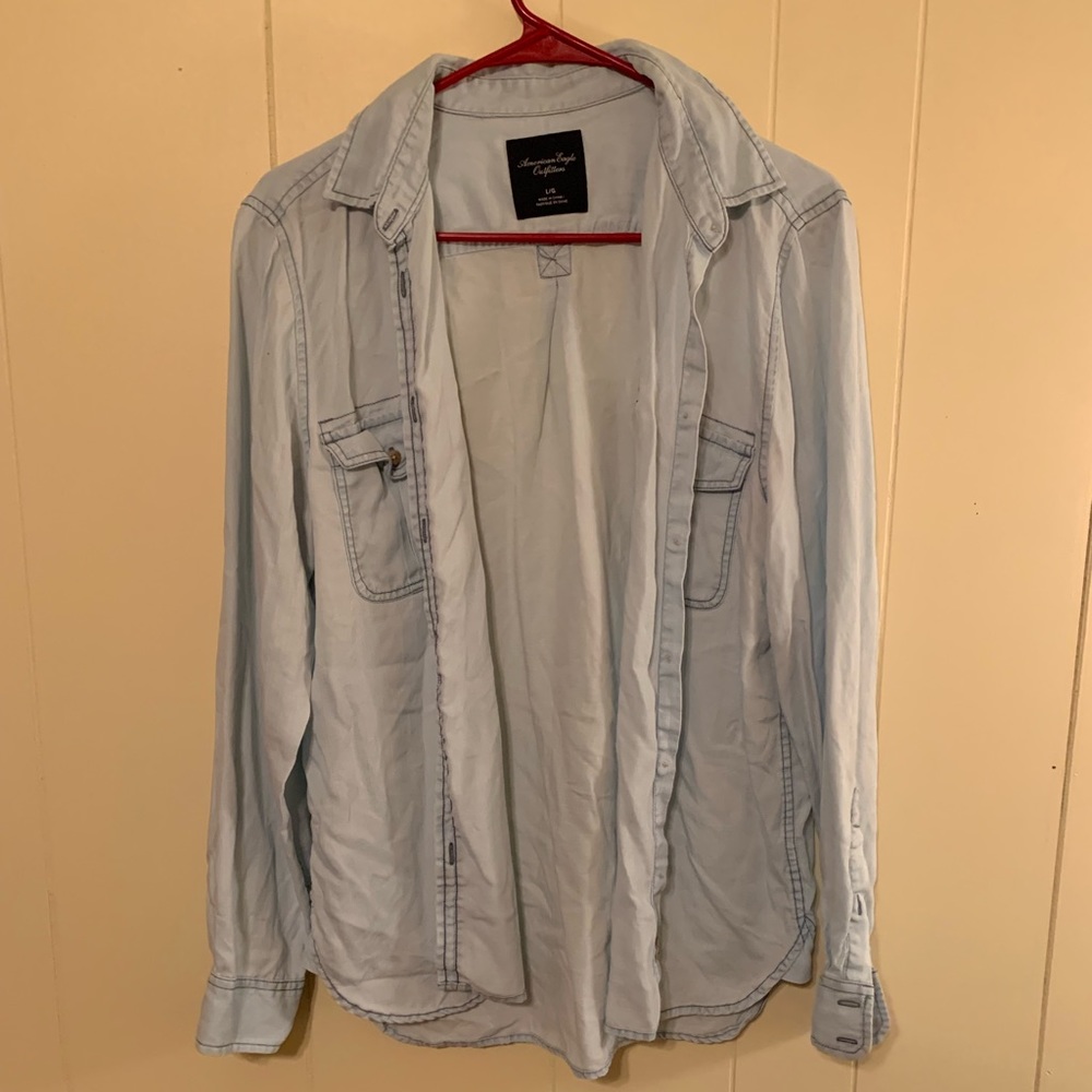 Blue long sleeve button-up shirt